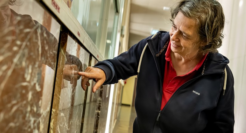 Curator showing the marble collection