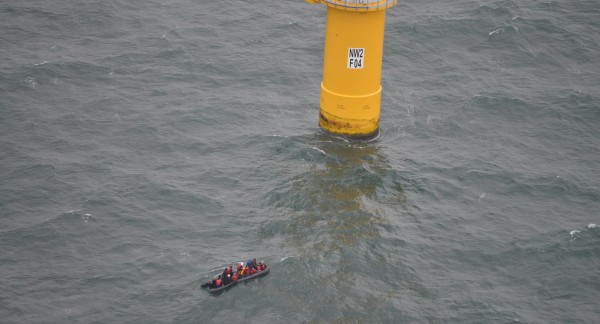 Rubber boat with 24 people on board adrift in the wind farms